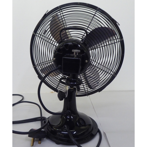 106 - A National Winder Cinni black enamelled finished electric table fan