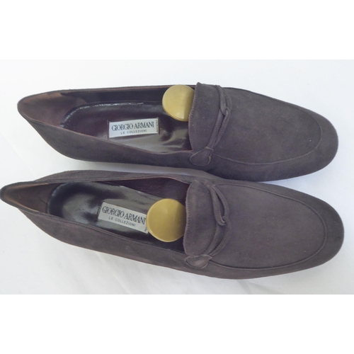 107 - A pair of Giorgio Armani brown suede loafers  size 38.5; and a pair of brown leather Stuart Weitzman... 