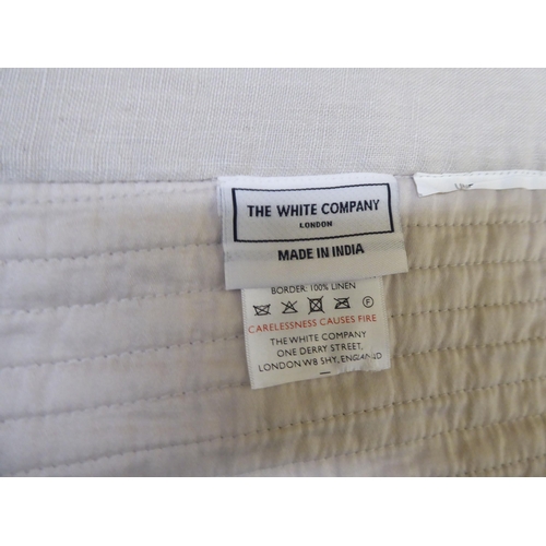 115 - A White Company cream/white coloured throw; and another faux fur example 