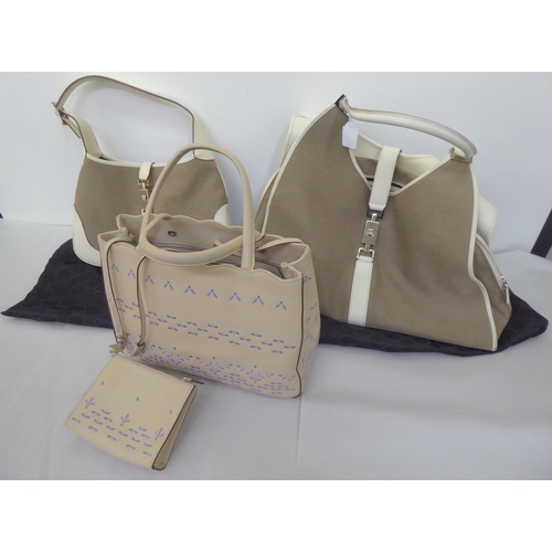 118 - A Gucci holdall and matching handbag in fawn and cream canvas with dust cover; and a Anya Hindmarch ... 