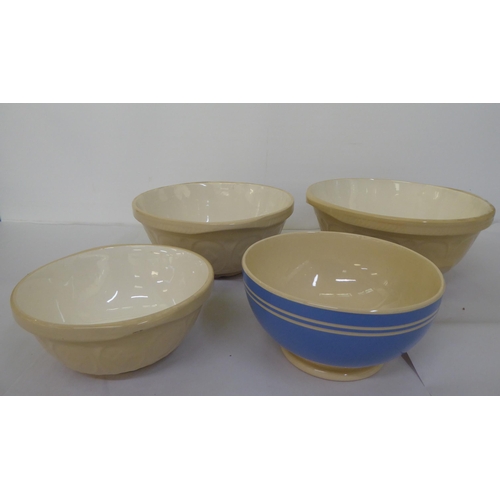 134 - Four ceramic mixing bowls: to include Gripstand