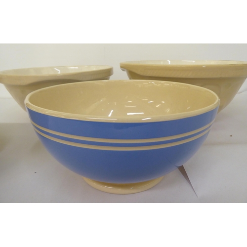 134 - Four ceramic mixing bowls: to include Gripstand