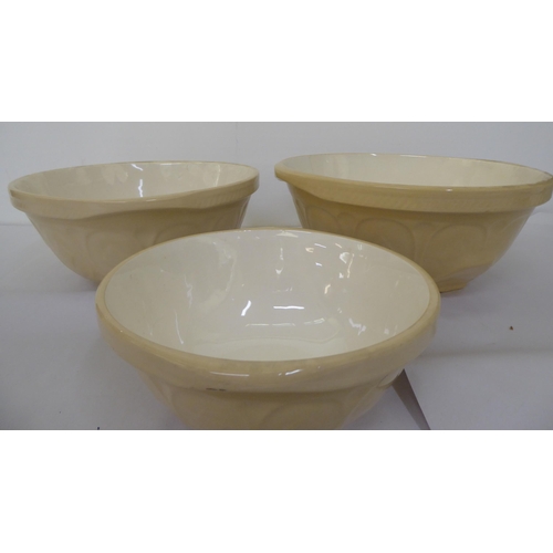 134 - Four ceramic mixing bowls: to include Gripstand