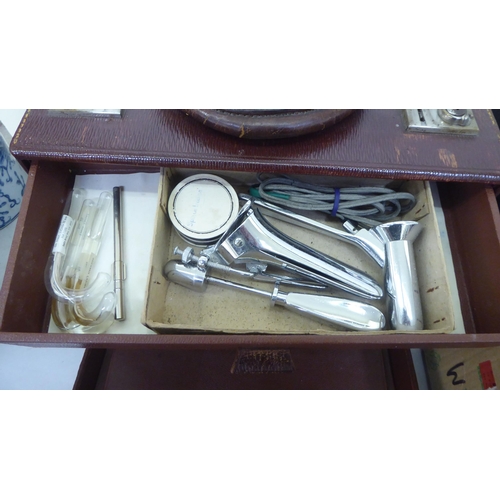 160 - Medical equipment: to include a Mayer & Phelps brown hide case with a fitted interior and access... 