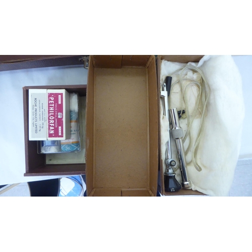 160 - Medical equipment: to include a Mayer & Phelps brown hide case with a fitted interior and access... 