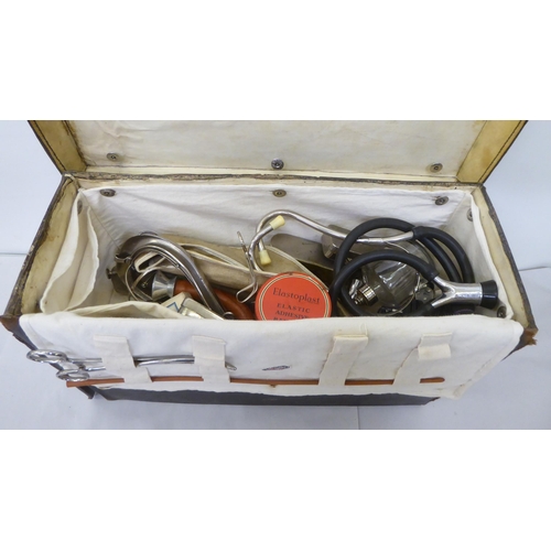 160 - Medical equipment: to include a Mayer & Phelps brown hide case with a fitted interior and access... 