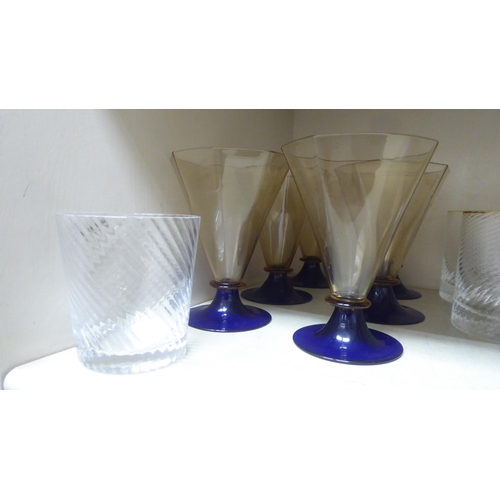 165 - Glassware: to include a set of five Murano wrythen moulded tumblers