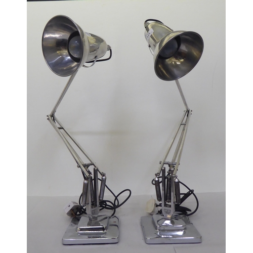 171 - A pair of Angelpoise lamps by Herbert Terry & Sons, in stainless steel, on square bases &nb... 