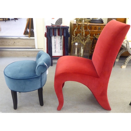 178 - A modern fully upholstered pillar box red bedroom chair with a high back and overstuffed seat; and a... 