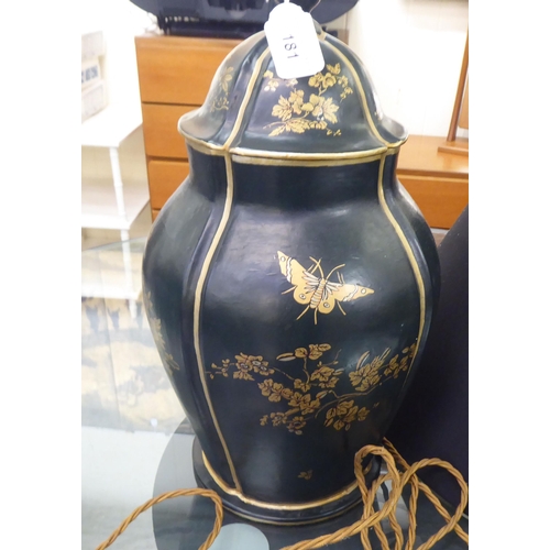 181 - A 19thC style black lacquered and gilded covered, baluster vase design table lamp  19