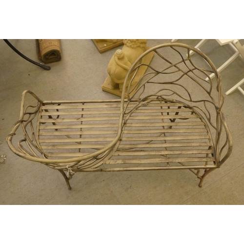 186 - A painted shabby-chic steel wire framed tête-à-tête 'lovers' seat with organically decorated backs