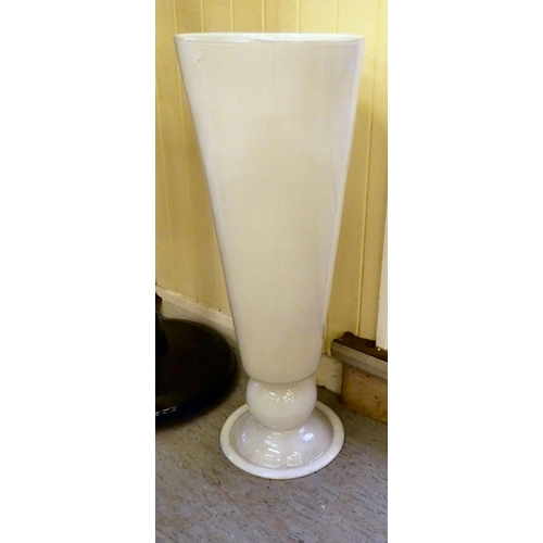 187 - A modern milk glass floorstanding vase of oversize pedestal wine design  32