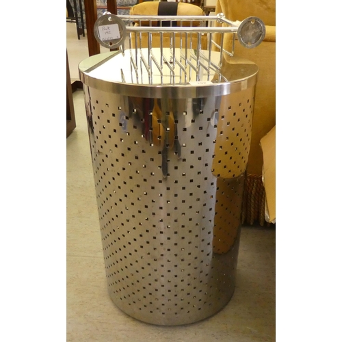 192 - A ventilated steel cylindrical linen bin and cover  24