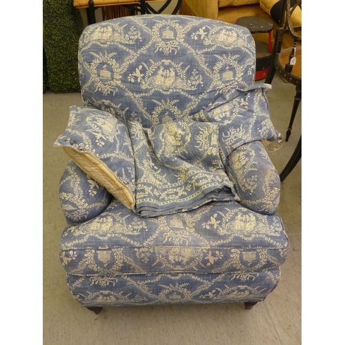 193 - A Victorian style bedroom armchair with printed blue and white patterned upholstered and a cushioned... 