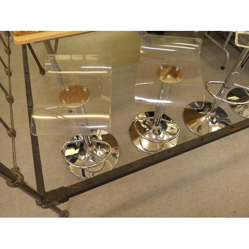 195 - A set of four modern chromium plated, height adjustable bar stools with clear perspex seats 