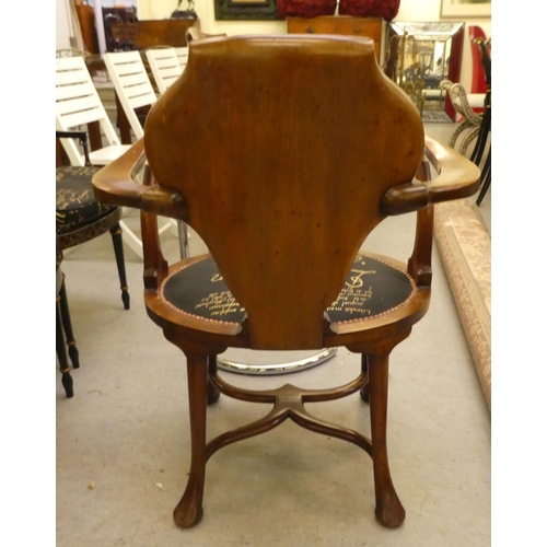 197 - An Edwardian style mahogany and marquetry elbow chair with a solid back and open arms, the upholster... 