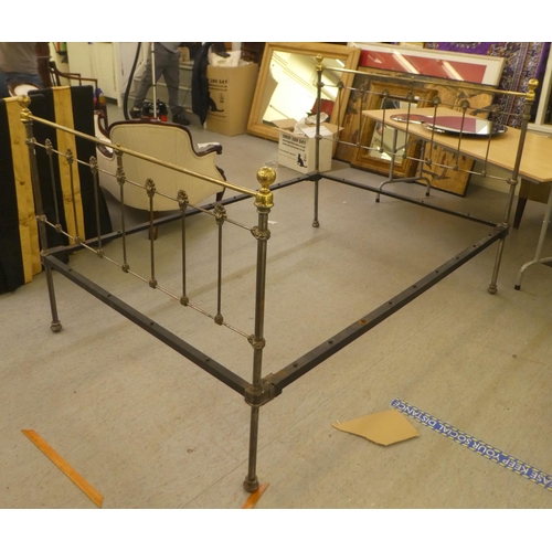 201 - A refurbished polished, tubular framed and brass, double bed frame and foot with side rails  54