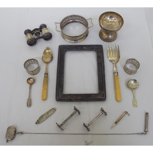 203 - Silver and silver plate: to include a double ended sundae dish; and a pair of knife rests 