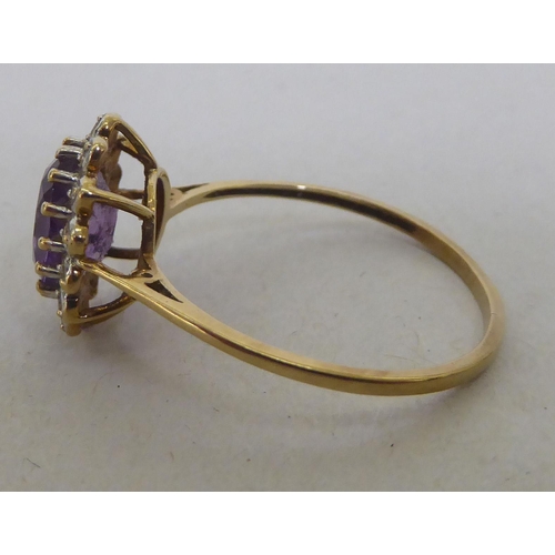 204 - A 9ct gold amethyst and diamond ring 