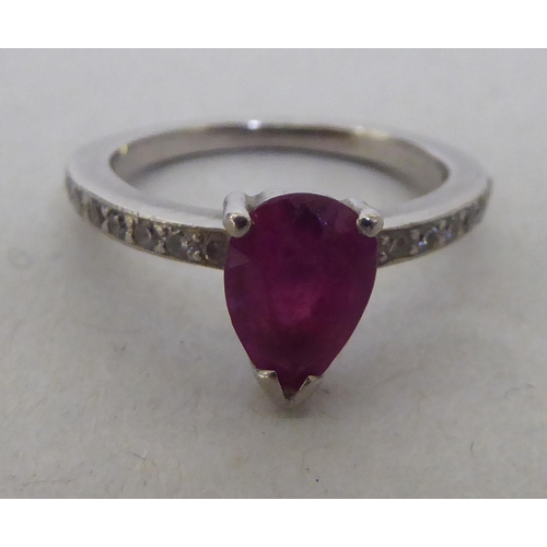 205 - An 18ct white gold rubellite and diamond claw set ring 