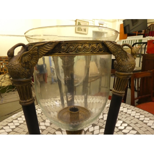 208 - A pair of black painted steel and brass vase stands, in neo-classical taste with clear glass liners,... 