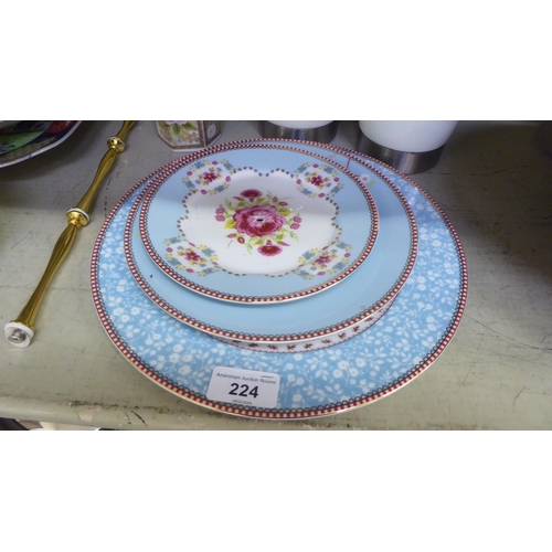 224 - A mixed lot: to include a pair of early 20thC Japanese porcelain Imari plates, decorated with flora&... 