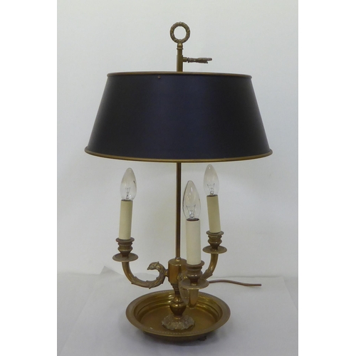 225 - A modern brass table lamp with three scrolled branches and a height adjustable shade  24