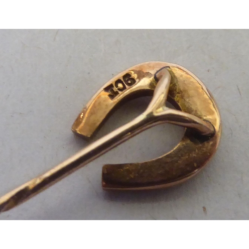 228 - Three dissimilar antique, variously set stick pins 