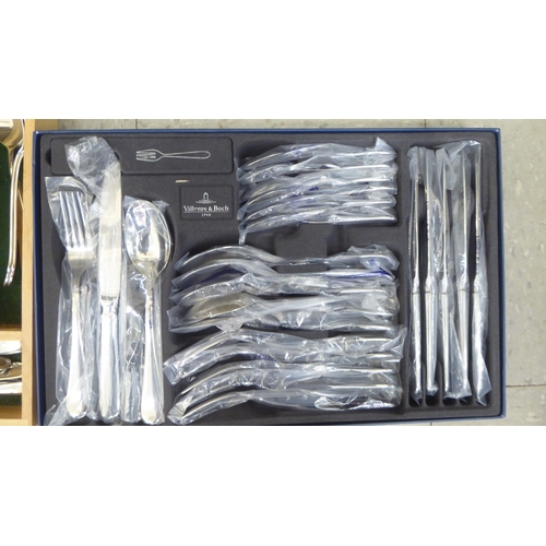 230 - A Villeroy & Bosh stainless steel set of cutlery and flatware, in a fitted case; and another, si... 