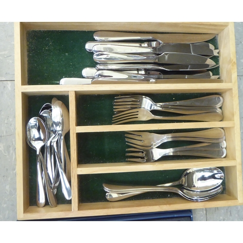 230 - A Villeroy & Bosh stainless steel set of cutlery and flatware, in a fitted case; and another, si... 