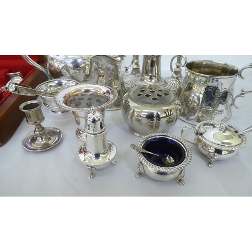 244 - Silver plate: to include a pair of candlesticks, each with a reeded column and an oval foot  10... 