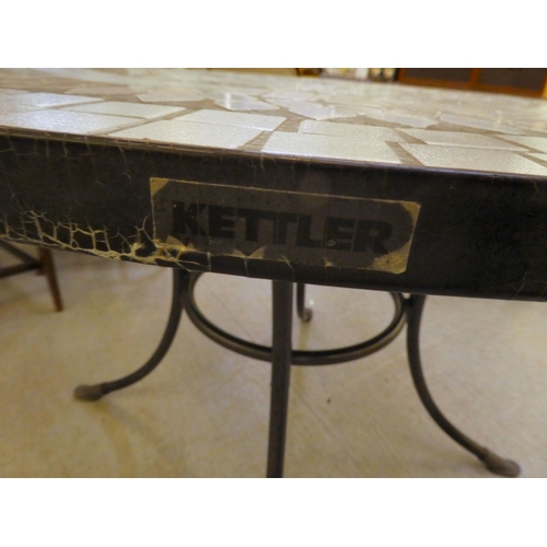 252 - A Kettler composition mosaic top garden table, on a wrought metal base  30