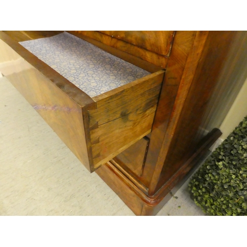 257 - A 19thC design mahogany commode with a black marble top, over four long drawers, on a plinth  3... 