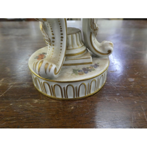 278 - A Dresden porcelain hinged egg cup design trinket box, on a tripod case and circular plinths  6... 