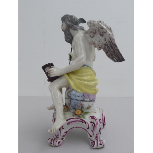 29 - A 20thC European porcelain figure 'Chronos'  6.25