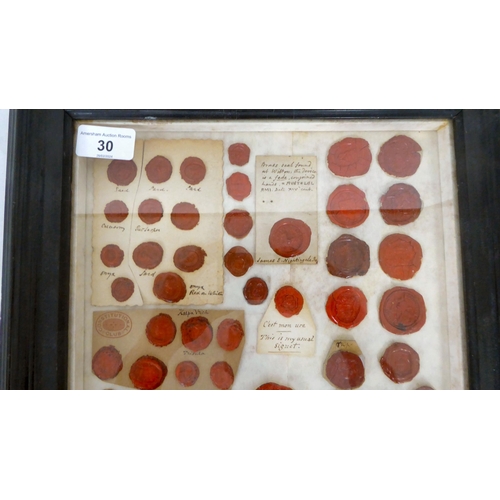 30 - A framed presentation of unused individually marked period wax seals  10