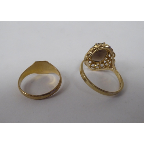 54 - A 9ct gold signet ring; and a 9ct gold smoky quartz set ring