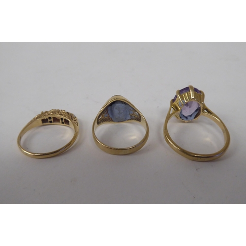 61 - Three 9ct gold rings, variously stone set