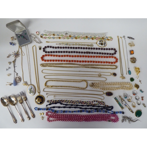 64 - Costume jewellery and silver flatware: to include bead necklaces