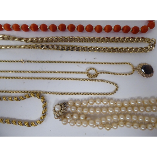 64 - Costume jewellery and silver flatware: to include bead necklaces