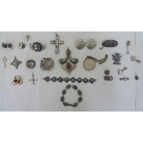 66 - Silver, silver coloured and white metal items of personal ornament: to include a pair of earrings; a... 