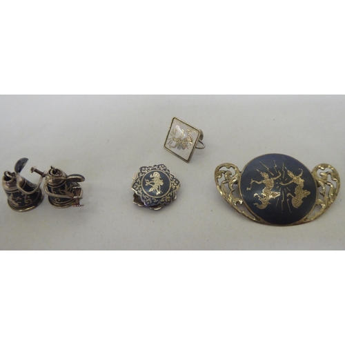 66 - Silver, silver coloured and white metal items of personal ornament: to include a pair of earrings; a... 