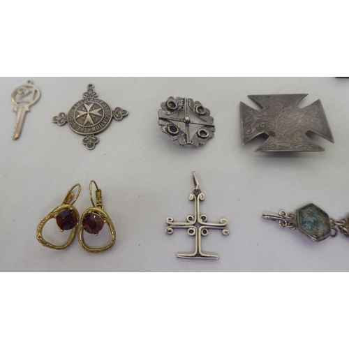 66 - Silver, silver coloured and white metal items of personal ornament: to include a pair of earrings; a... 