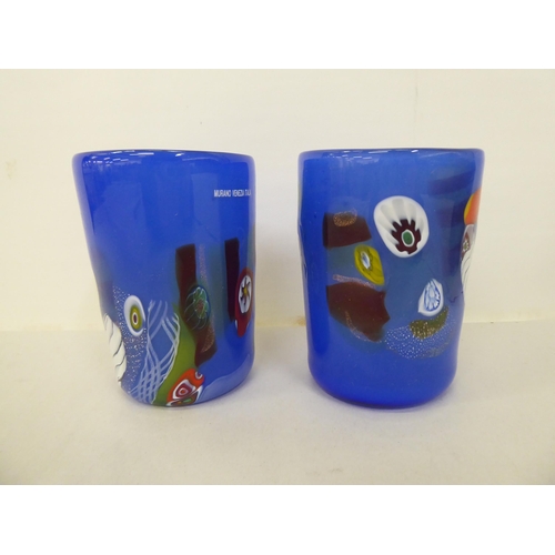 68 - Two similar Murano glass beakers, decorated geometric patterns of a deep blue ground  boxed