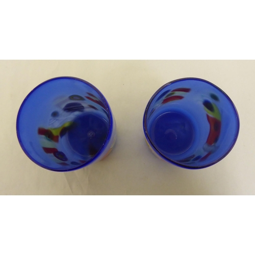 68 - Two similar Murano glass beakers, decorated geometric patterns of a deep blue ground  boxed