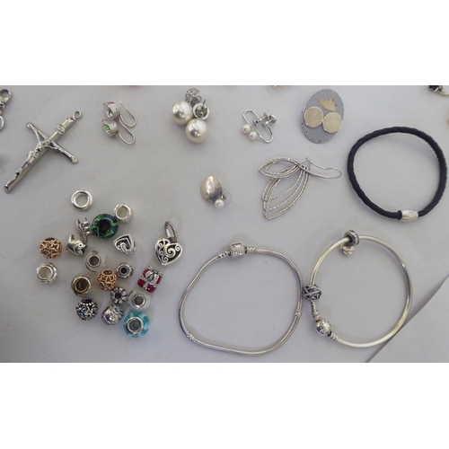 71 - Silver and white metal items of personal ornament: to include a pair of LOVE earrings; and assorted ... 