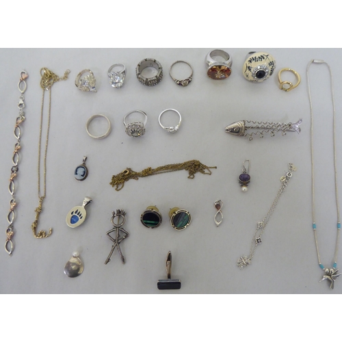 76 - Silver, white metal and other items of personal ornament: to include a fish design brooch; and dress... 