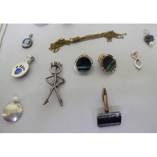 76 - Silver, white metal and other items of personal ornament: to include a fish design brooch; and dress... 