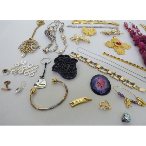 82 - Costume jewellery: to include yellow metal, coloured bead necklaces; coin and other pendants