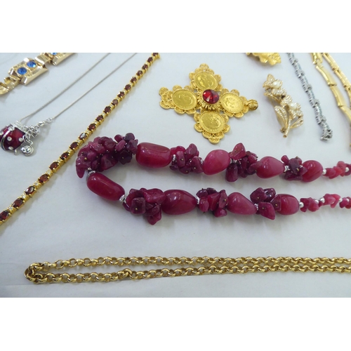 82 - Costume jewellery: to include yellow metal, coloured bead necklaces; coin and other pendants